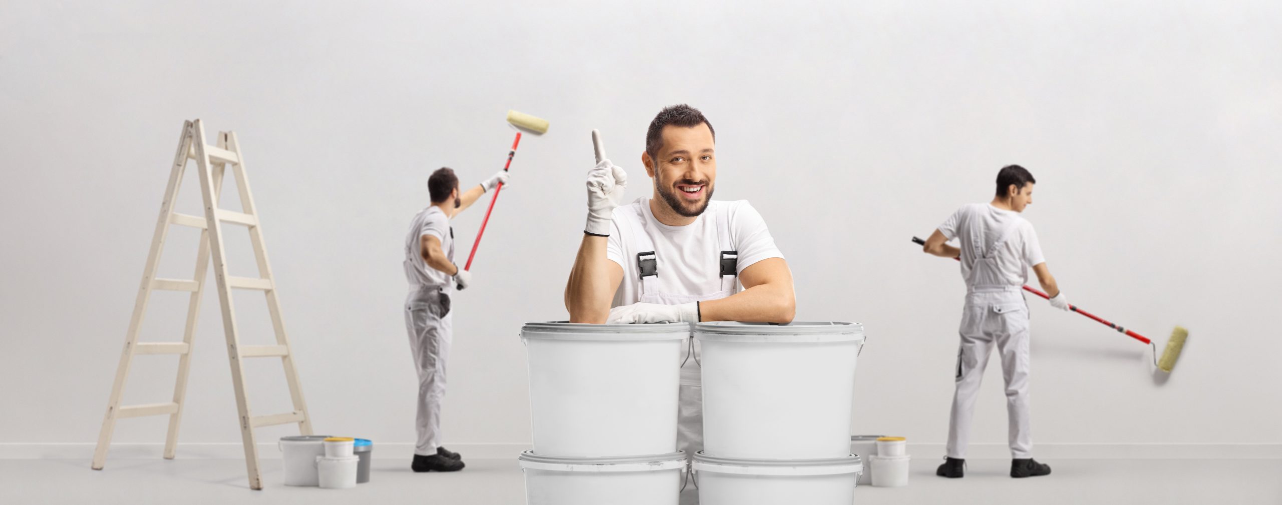 House,Painter,Leaning,On,Buckets,And,Pointing,Up,And,Other